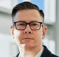 暗号資産取引会社のエグゼクティブ、Alexander Hughes CEO のポートレート